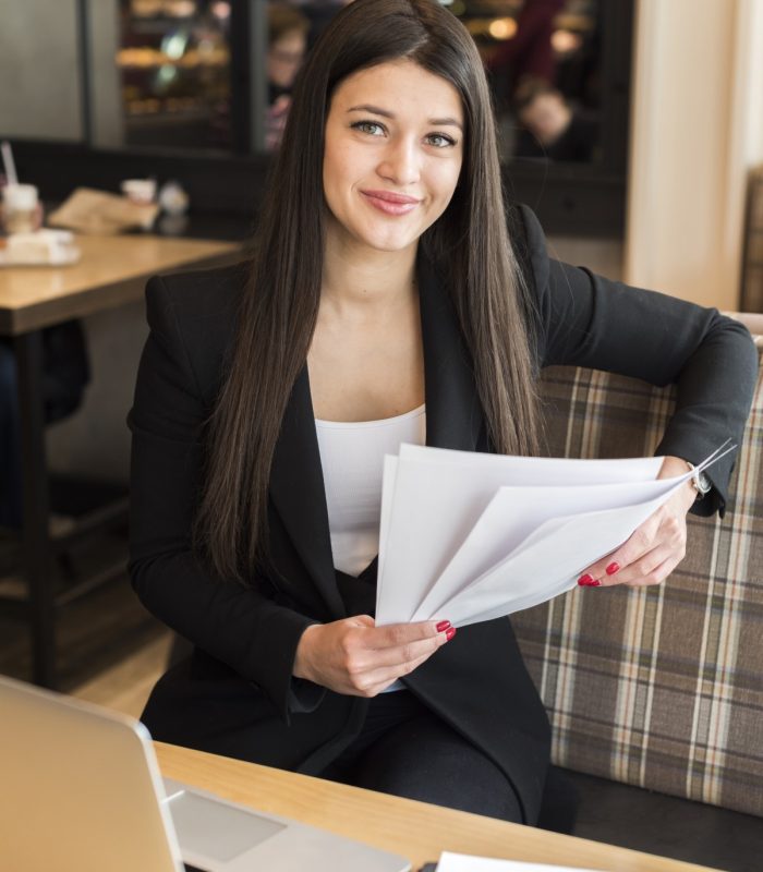 businesswoman-reading-document businesswoman-reading-document